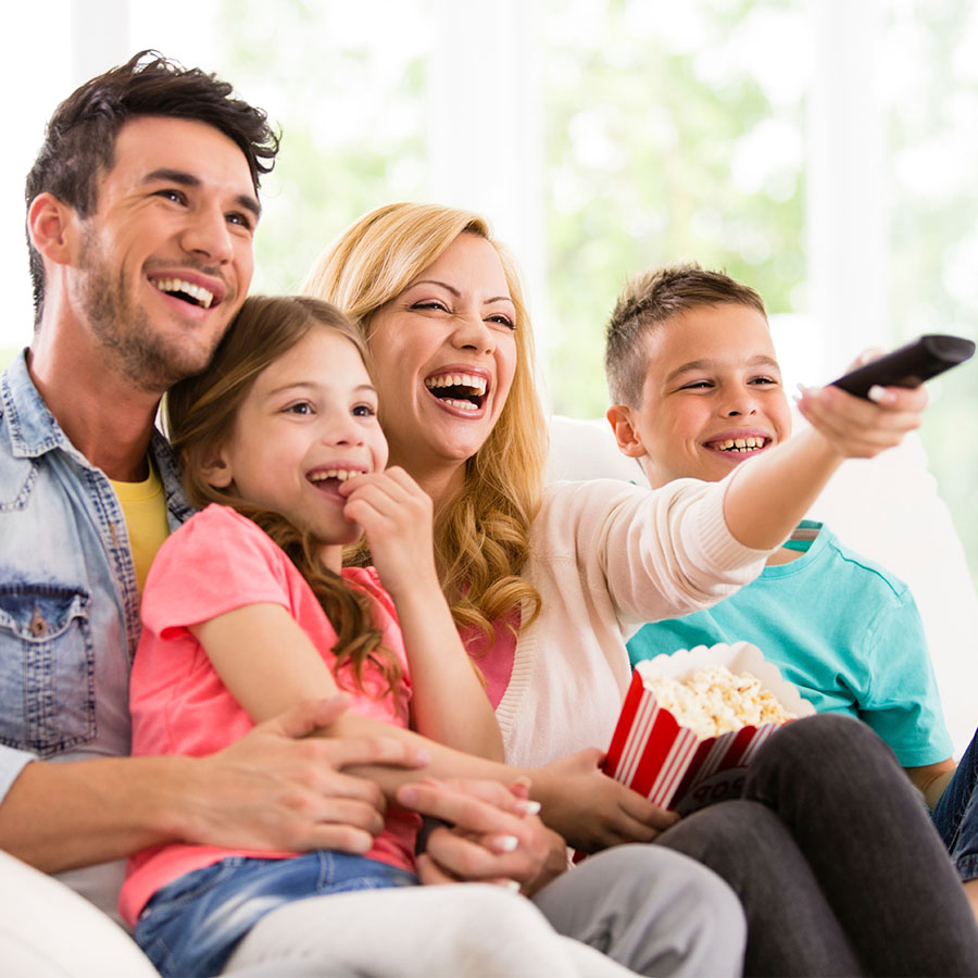 Parents and children watching tv